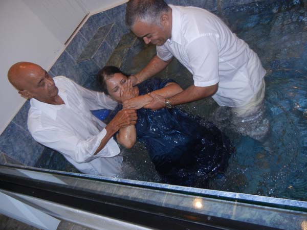 Laura García Torres, 57 years of age, is baptized Sept. 13, 2015, by José Álamo and Rafael Torres, in the Bayamon, Puerto Rico church of Christ. 