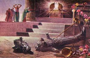 Al día siguiente de colocar los filisteos el arca del pacto en el templo de su dios Dagón, a este lo encuentran “postrado en tierra delante del arca”. Volviéndolo a su lugar, el próximo día lo hallan tumbado, sin cabeza y sin las palmas de sus manos.