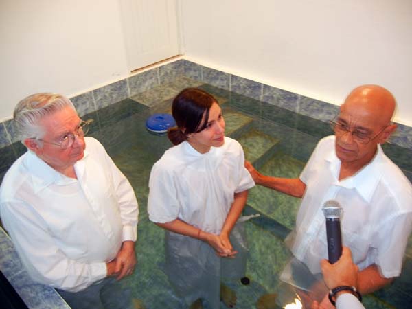 Dewayne Shappley and José Álamo baptize Ada Marie in the Bayamon, Puerto Rico church of Christ, November 29, 2015.