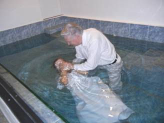 Elisa Cruz baptized by Dewayne Shappley in the church of Christ, Bayamon, Puerto Rico. Year 2012.