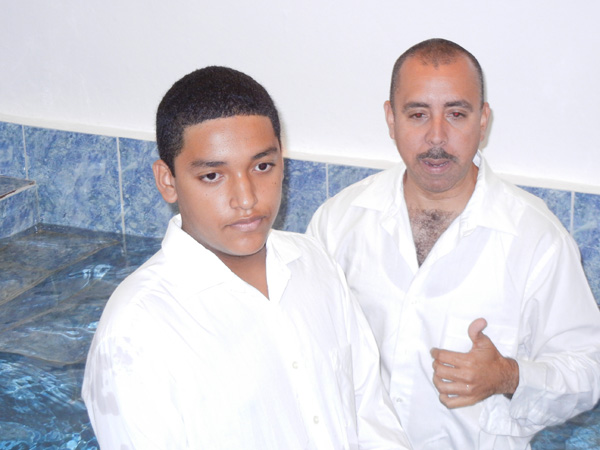 Rodolfo Báez is baptized by Jorge Ginés López, March 31, 2013, in the church of Christ, Alturas de Flamboyán, Baymón, Puerto Rico. 