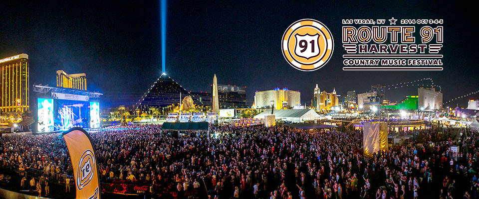 This photograph shows part of a great multitude of people -up to 22,000, or more- who came together on a fifteen-acre, concrete paved lot, surrounded by various casinos, in Las Vegas, Nevada, United States of America, for the fourth Country Music Festival. The 2017 one ended tragically Sunday, October 1, at about 10 p. m., when Stephen Paddock, shooting from the 32nd floor of the Mandalay Bay Resort and Casino, killed fifty-eight people, also wounding 527. 